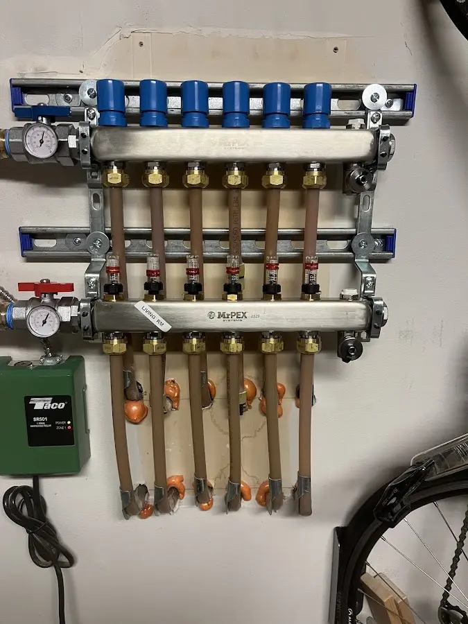 Plumber performing Water Heater Repair at a residential property in Carthage